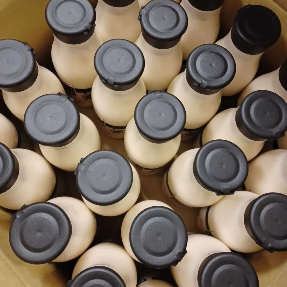 LOT OF APPROX 25 X 250ML AQUOLINA WHITE CHOCOLATE & ORCHID BODY MILK