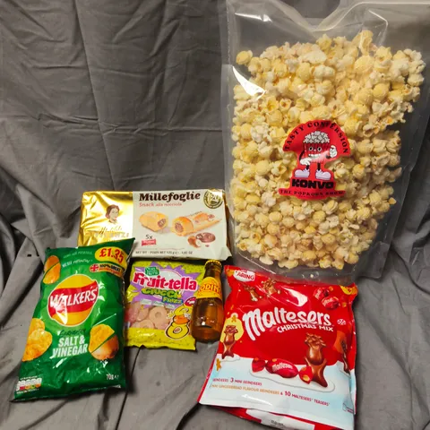 APPROXIMATELY 10 ASSORTED FOOD ITEMS TO INCLUDE KONVO THE POPCORN SHOW, MALTESERS CHRISTMAS MIX, WALKERS SALT & VINEGAR CRISPS, ETC