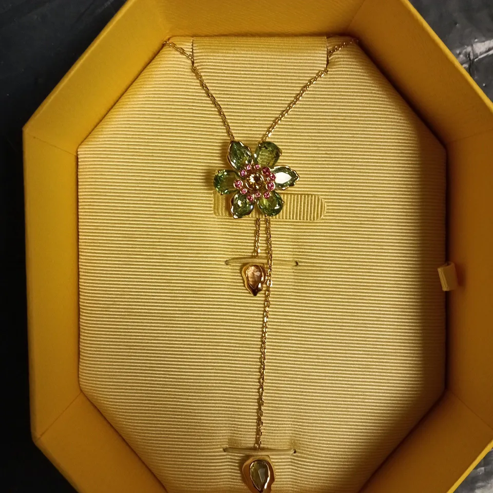 SWAROVSKI FLORAL PENDANT NECKLACE WITH GREEN STONES AND PINK CENTRE