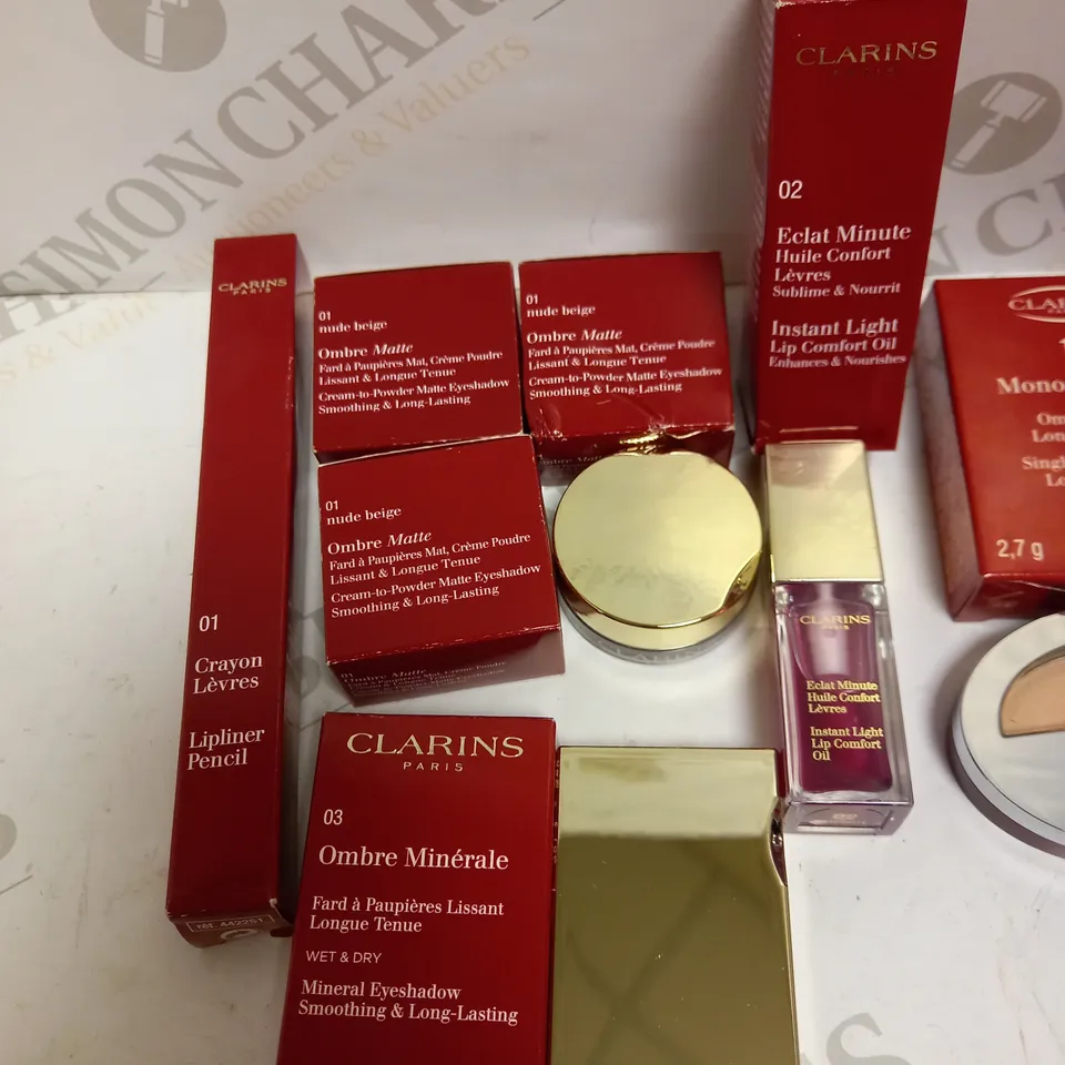 LOT OF APPROX 10 TO INCLUDE CLARINS MATTE EYESHADOW , CLARINS INSTANT LIGHT LIP OIL , ETC