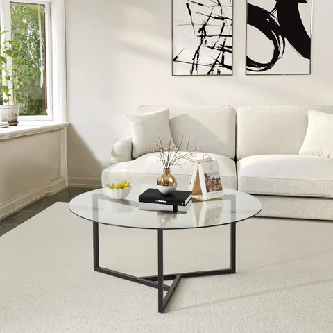 BOXED OKKRA ROUND GLASS COFFEE TABLE CLEAR GLASS