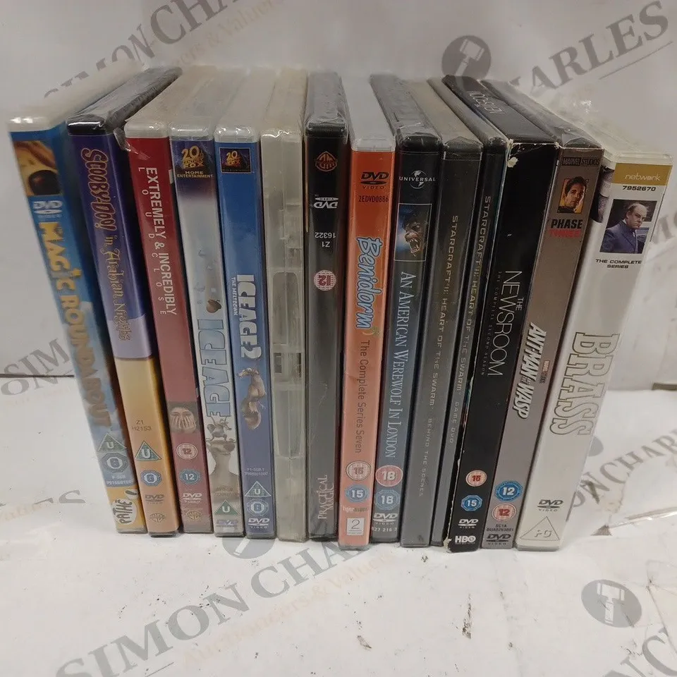 BOX OF APPROXIMATELY 15 ASSORTED DVDS TO INCLUDE THE COMPLETE FAULTY TOWERS, CASINO ROYALE, WHERE THE WILD THINGS ARE, ETC