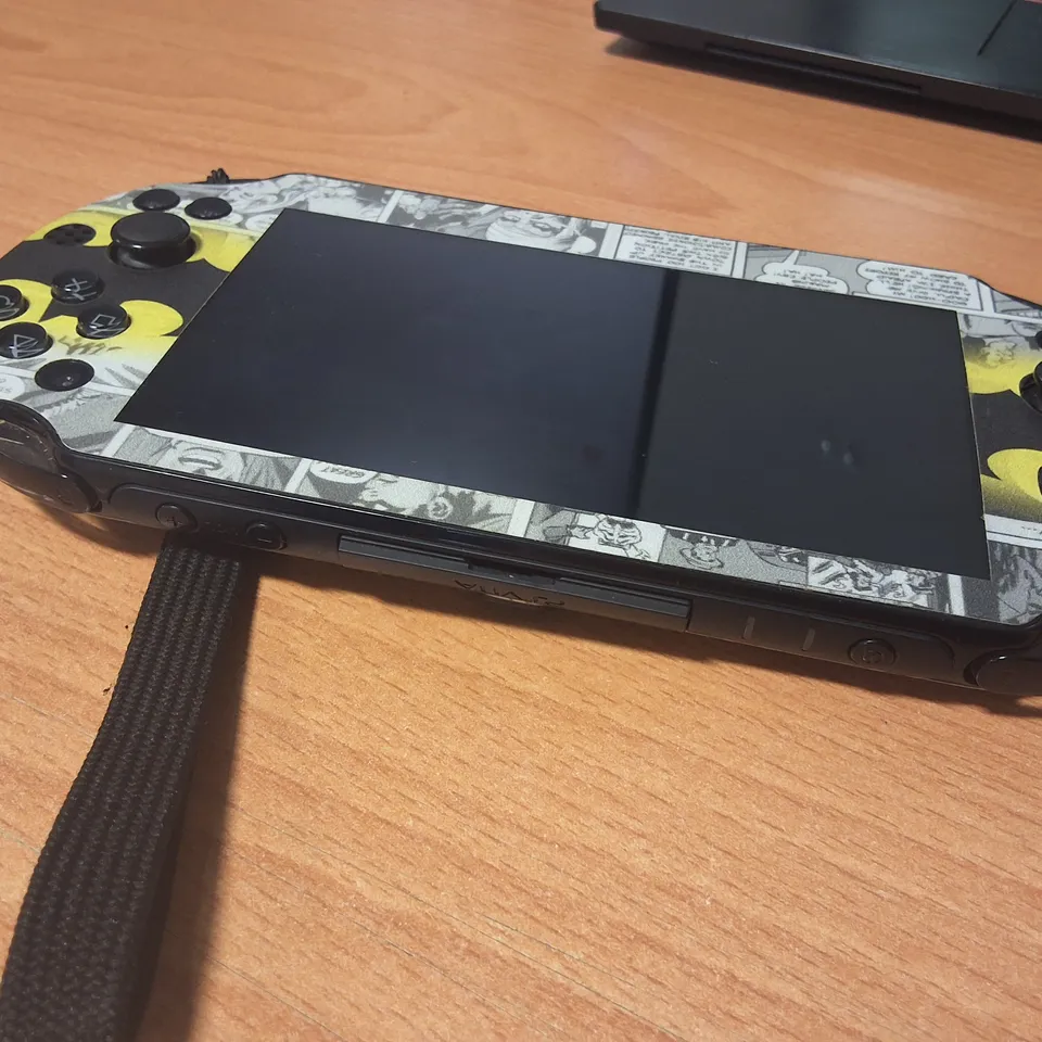 UNBOXED PSVITA BATMAN THEMED HANDHELD GAMING DEVICE