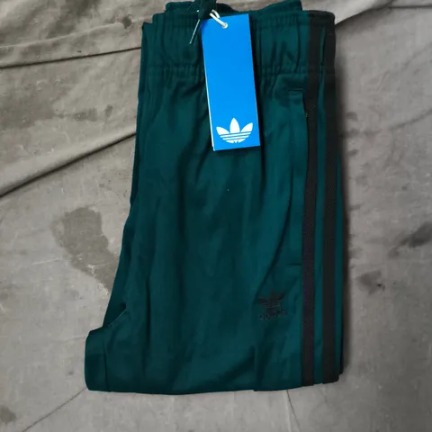 ADIDAS KIDS SST TRACK PANTS IN DARK GREEN SIZE 10/11 YEARS