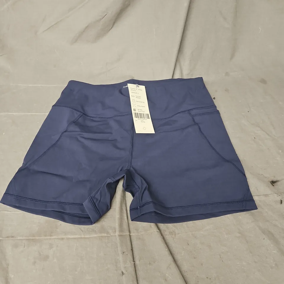 SWEATY BETTY POWER 4" BIKER SHORTS IN NAVY BLUE SIZE L