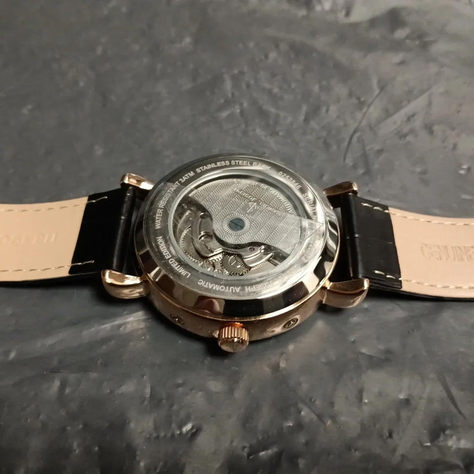 SAMUEL JOSEPH AUTOMATIC WRISTWATCH WITH BLACK DIAL AND SKELETON MOVEMENT
