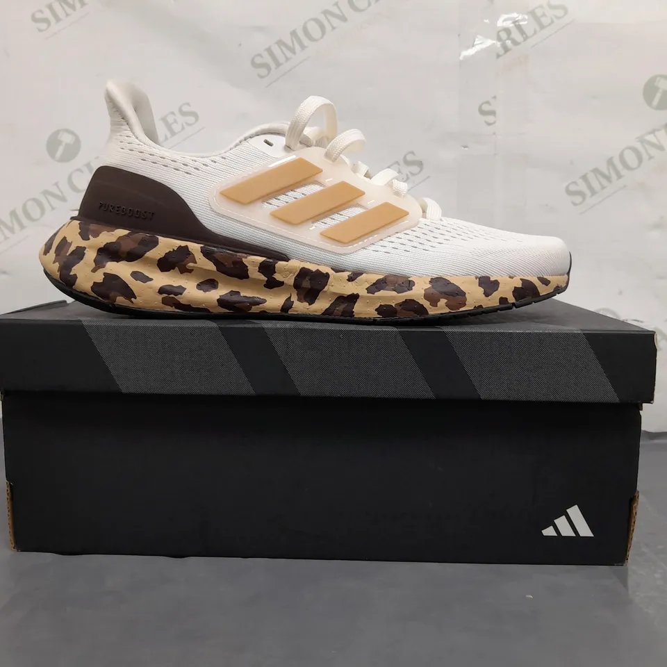 BOXED PAIR OF ADIDAS PUREBOOST 23 SHOES IN WHITE/TAN/ANIMAL PRINT UK SIZE 3.5