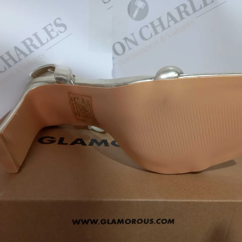 BOXED PAIR OF LADIS GLAMOROUS HEELS IN GOLD SIZE UK7 