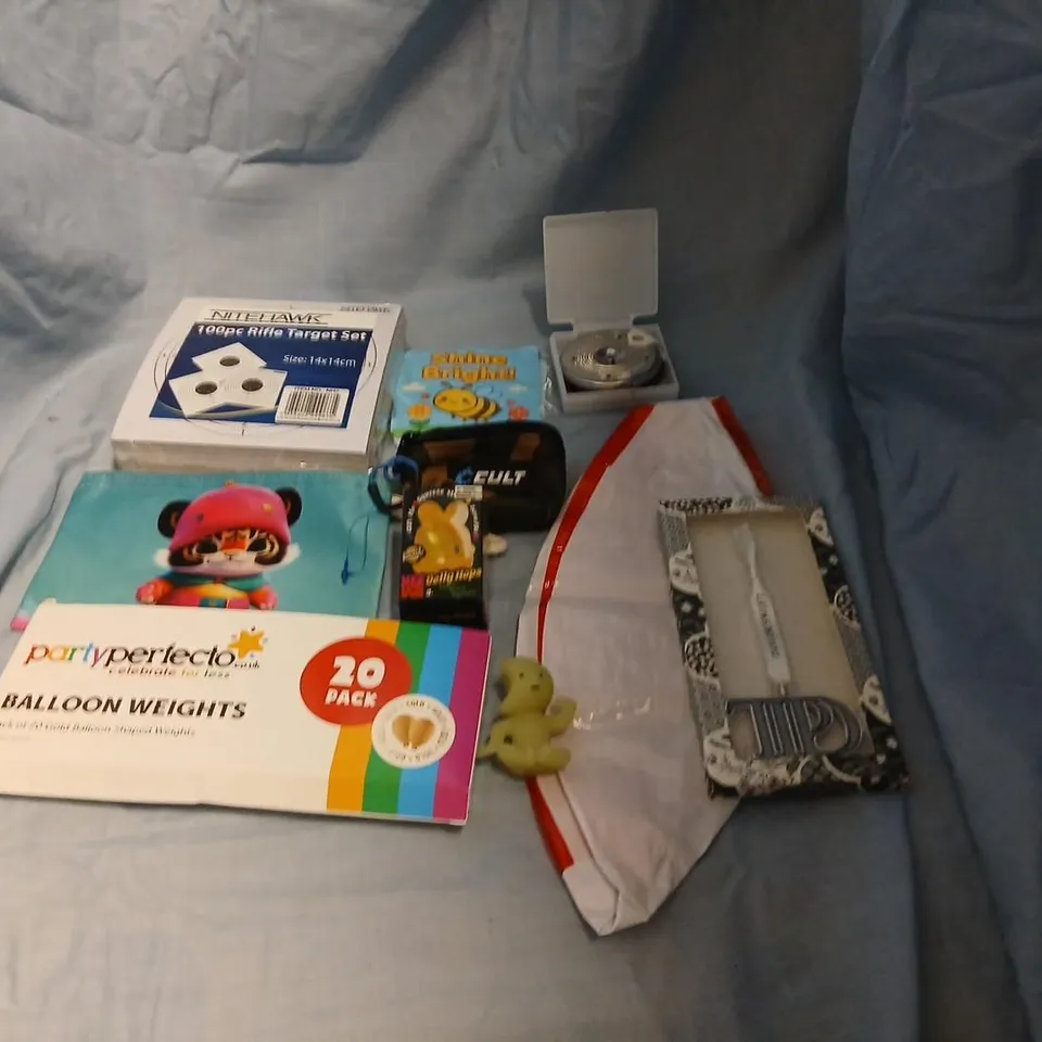 LARGE QUANTITY OF ASSORTED TOYS AND ACCESSORIES TO INCLUDE; THE TORTURED POETS DEPARTMENT LOGO ORNAMENT, BALLOON WEIGHTS, 100PC RIFLE TARGET SET, NEE DOH JELLY HOPS AND INFLATABLES