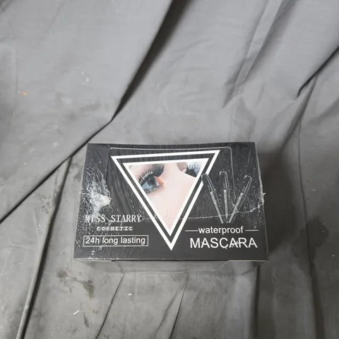 BOX OF APPROXIMATELY 24 MISS STARRY COSMETIC WATERPROOF MASCARA - NO USE BY DATE VISIBLE