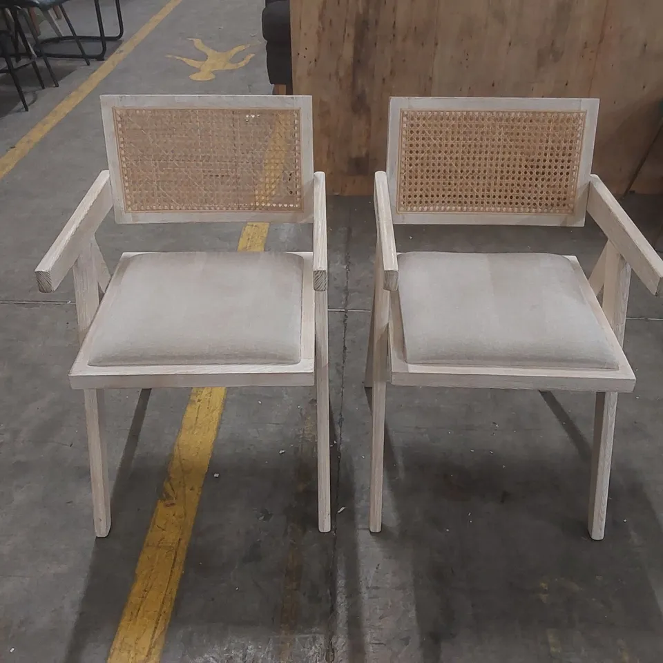 PAIR OF DESIGNER SOLID WOOD DINING CHAIRS WITH RATTAN BACK AND PADDED SEAT