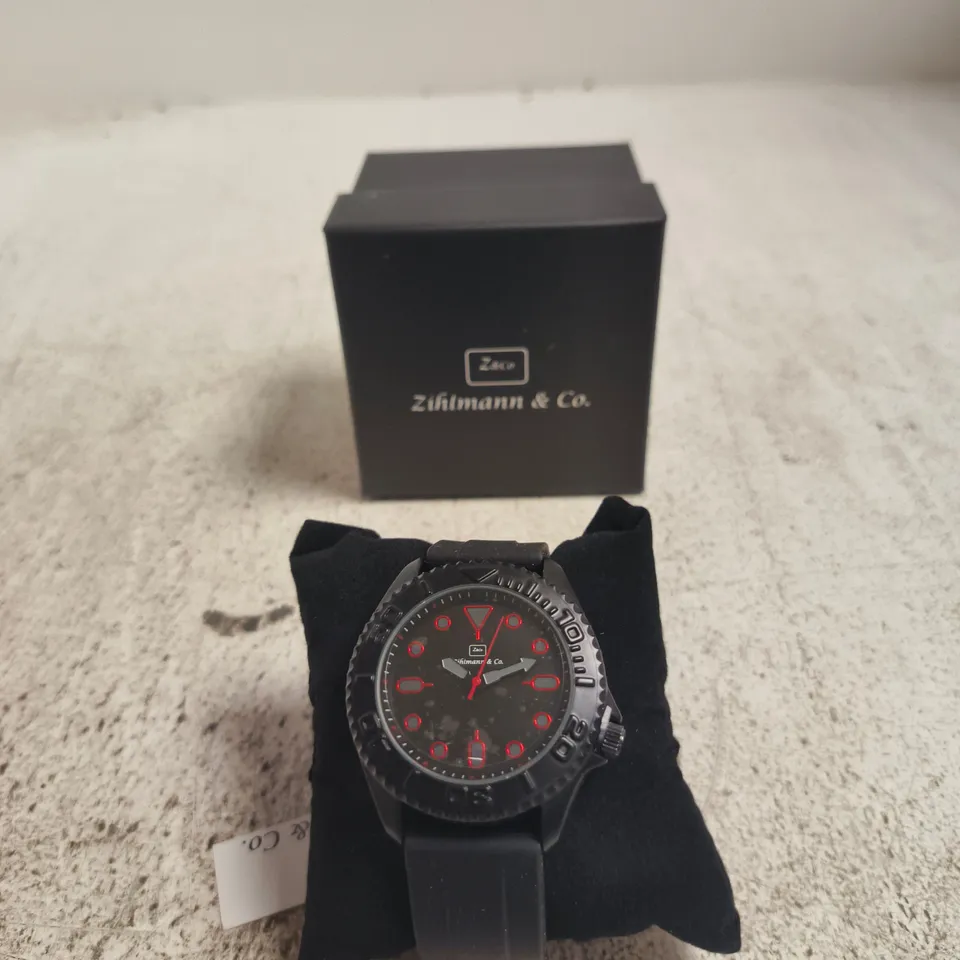 ZIHLMANN & CO. WRISTWATCH – BLACK DIAL WITH RED ACCENTS, BOXED