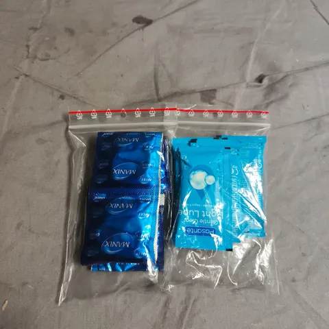 APPROXIMATELY 10 PACKS OF ASSORTED CONDOMS AND LUBE SACHETS