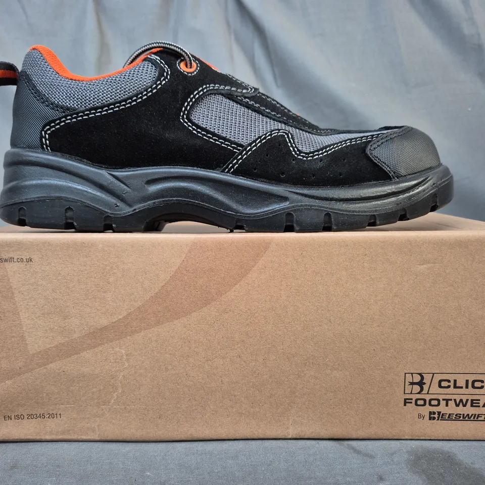 BOXED PAIR OF CLICK TRADERS NON-METALLIC TRAINER SHOES IN BLACK/GREY/ORANGE EU SIZE 43