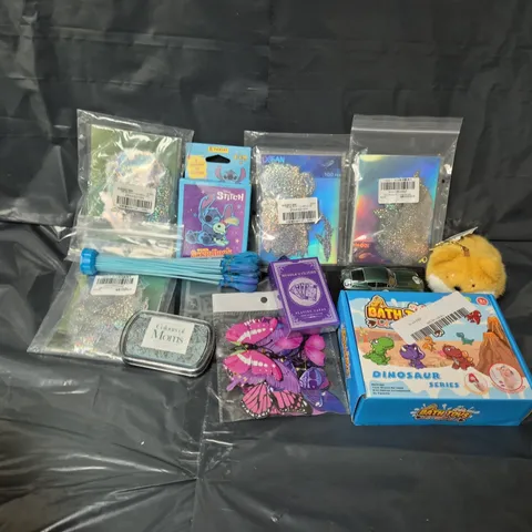 APPROXIMATELY 15 ASSORTED TOYS & GAMES TO INCLUDE ASTON MARTIN DIE-CAST CAR, PLAYING CARDS, MIMA FLUFFY CAT DAYS KEYRING, ETC