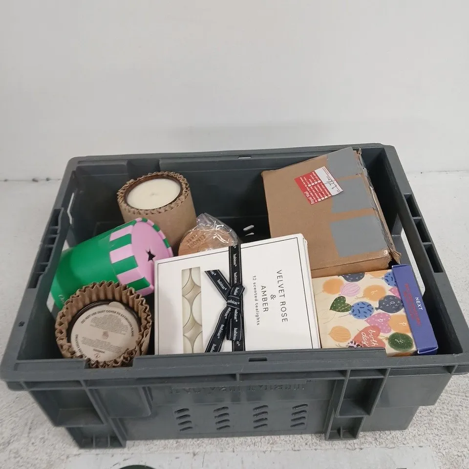 TOTE OF APPROXIMATELY 10 ASSORTED ITEMS INCLUDING SOME LIGHT BULBS, A NEXT WHITE JASMINE SCENTED CANDLE AND SOME HABITAT VELVET ROSE & AMBER SCENTED TEALIGHTS