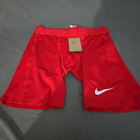 NIKE DRI FIT RED SHORTS - MENS LARGE