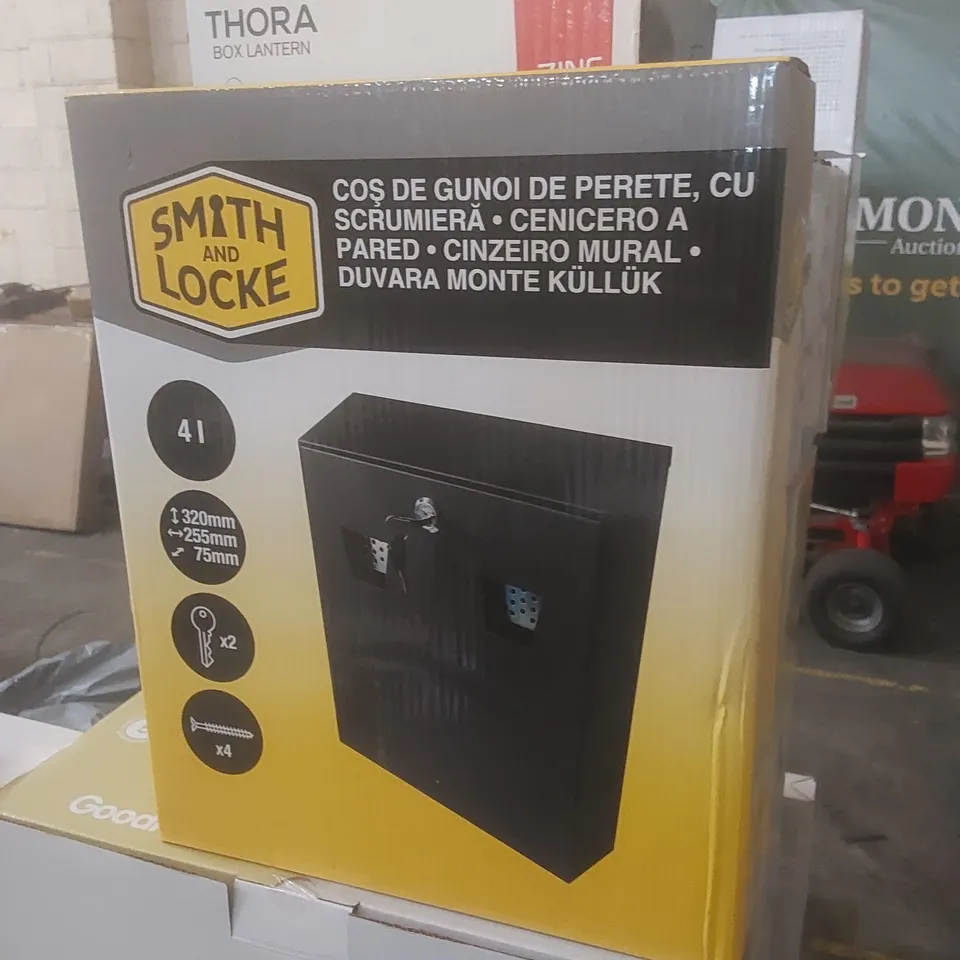 BOXED SMITH AND LOCKE WALL MOUNTED CIGARETTE BIN