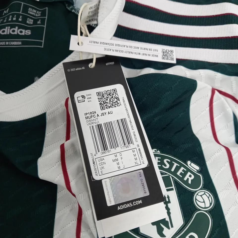 MANCHESTER UNITED 3RD KIT GREEN AND WHITE - SIZE M
