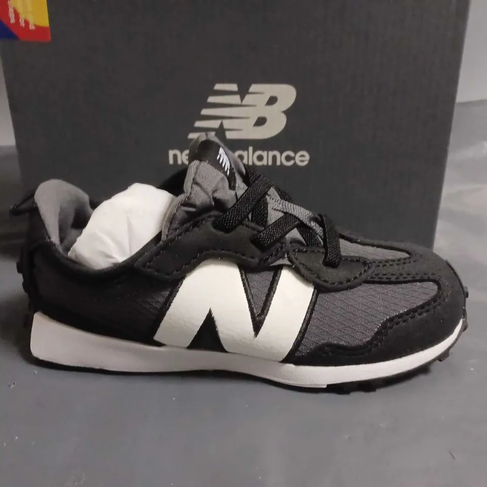 PAIR OF NEW BALANCE KIDS TRAINERS - UK 9.5