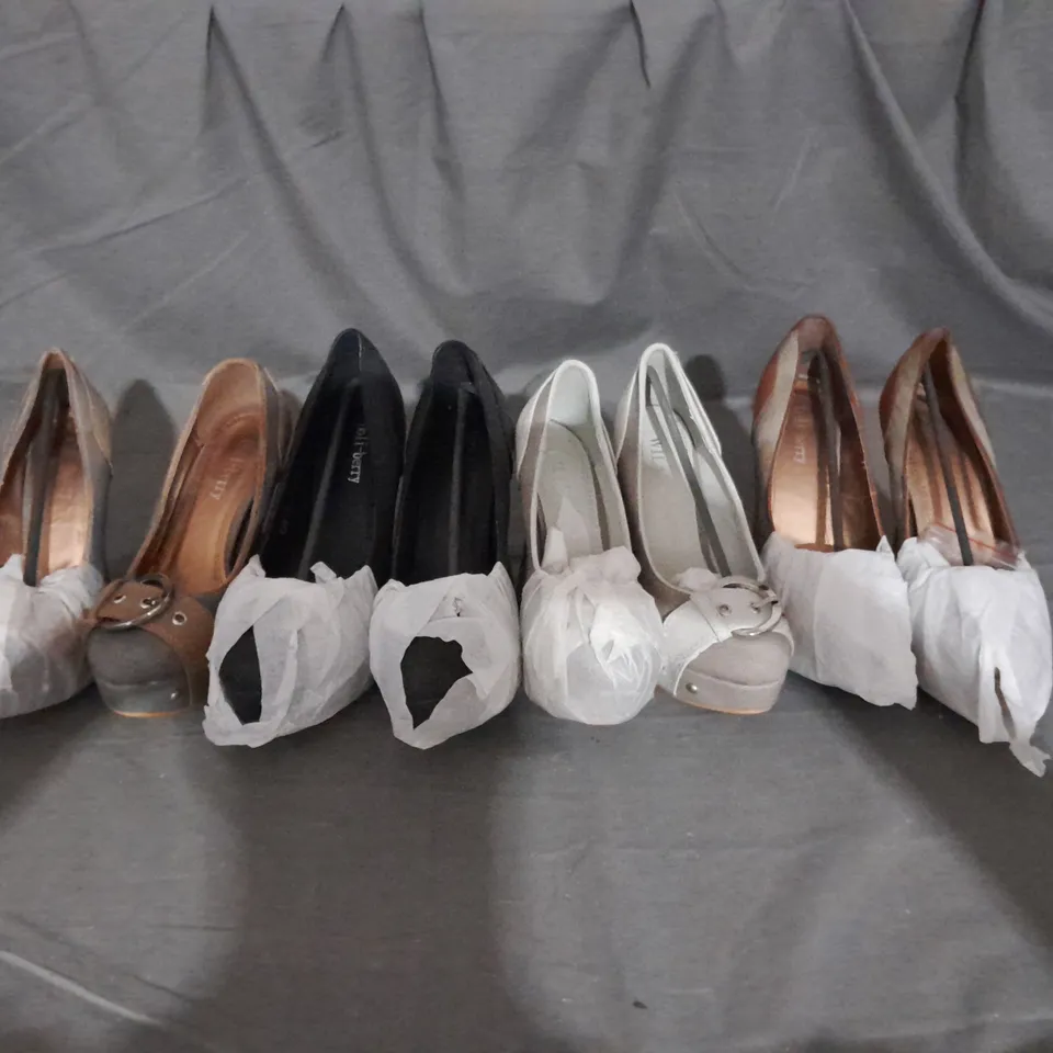 APPROXIMATELY 10 BOXED PAIR OF HEELED PLATFORM SHOES IN VARIOUS COLOURS AND SIZES 