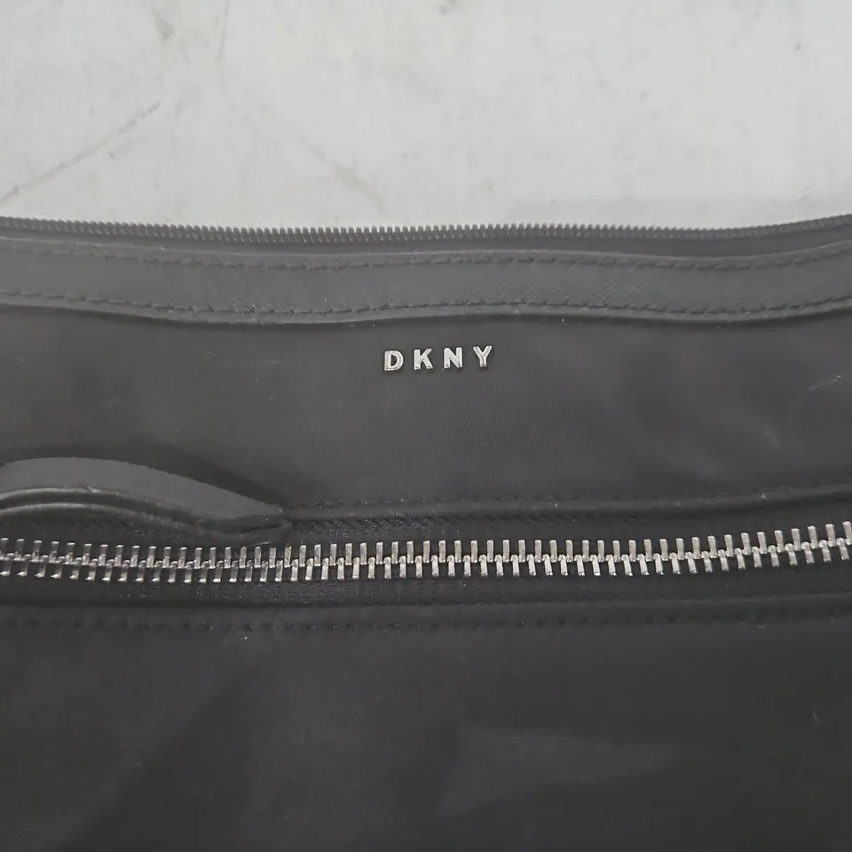 DKNY BLACK MINI BACKPACK WITH FRONT ZIP POCKET