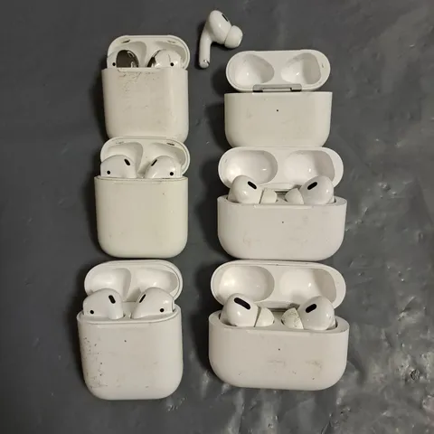LOT OF 5 ASSORTED WIRELESS EARBUDS IN WHITE