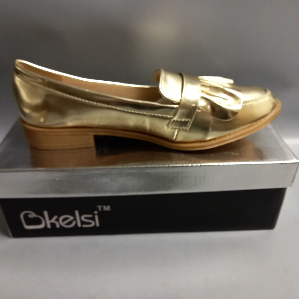 BOXED KELSI LADIES FLAT GOLD BROGUES. SIZE 6
