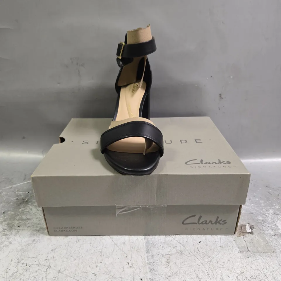 BOXED PAIR OF CLARKS OPEN TOE BLOCK HEEL SHOES IN BLACK SIZE 6