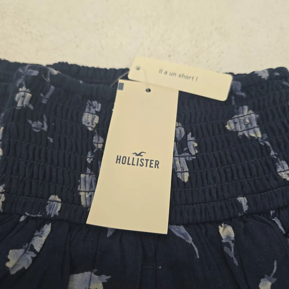 HOLLISTER WOMEN'S FLORAL PRINT SKIRT – NAVY, ELASTICATED WAIST, SIZE X SMALL