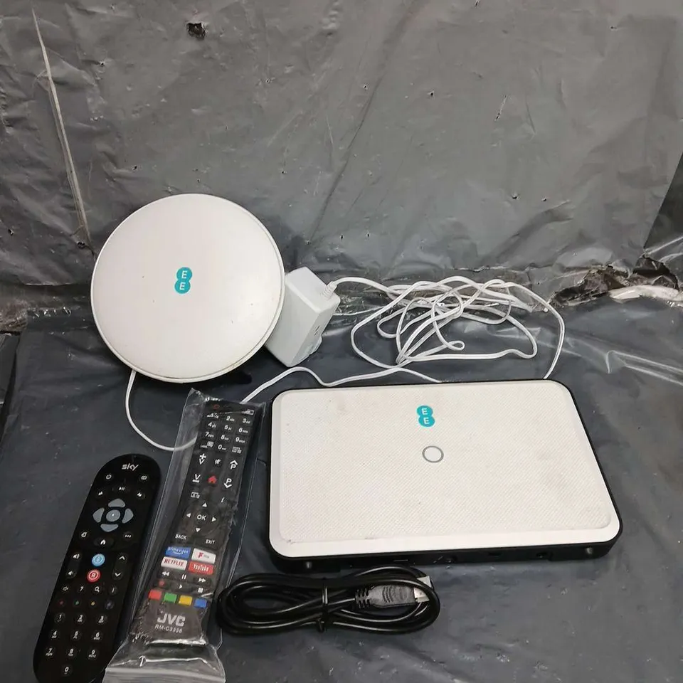TOTE OF APPROXIMATELY 15 ELECTRICAL ITEMS TO INCLUDE - REMOTE CONTROLS - POWER CABLES - EE WIFI HUB