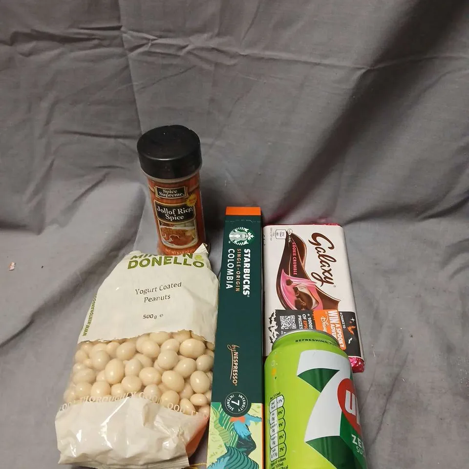 BOX OF APPROX 10 ASSORTED FOOD AND DRINK ITEMS TO INCLUDE : DONELLO YOGURT COATED PEANUTS, SPICE SUPREME JOLLOF RICE SPICE, STARBUCKS COLOMBIA COFFEE, GALAXY CHOCOLATE
