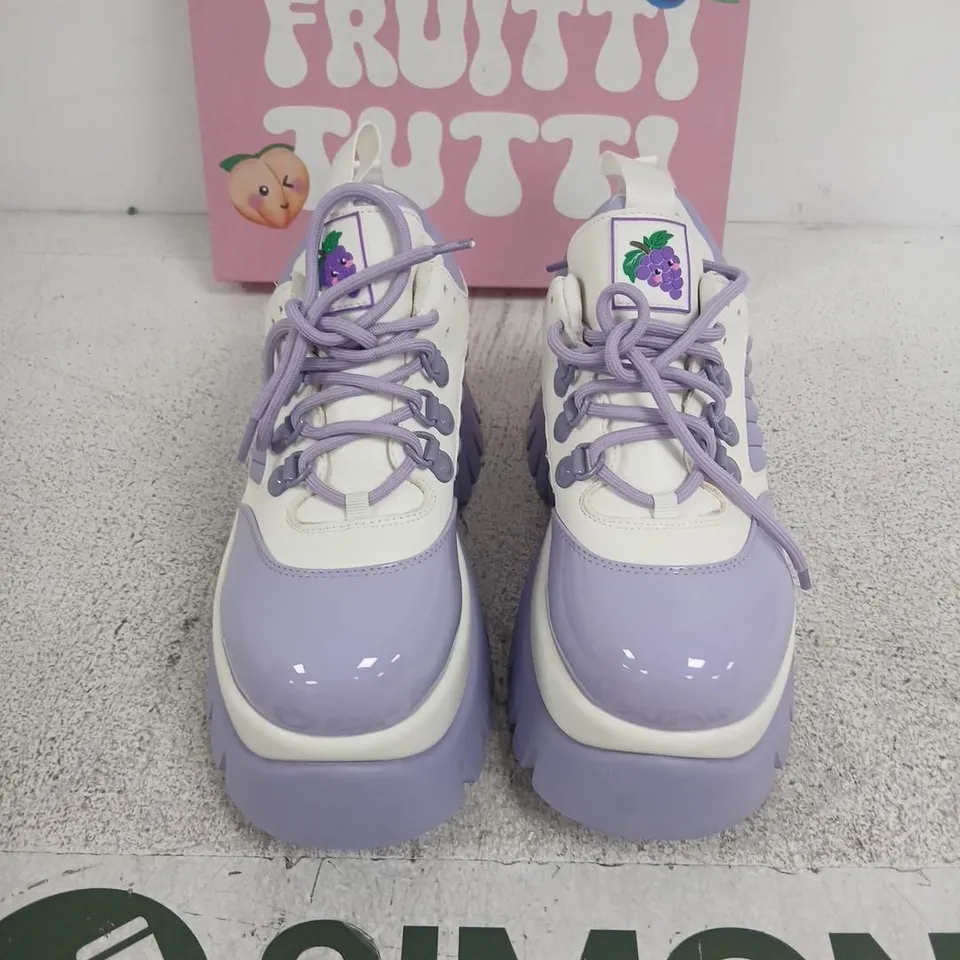 BOXED PAIR OF KOI FRUITTI TUTTI GRAPE JELLY TRAINERS IN PURPLE/WHITE SIZE UK 5