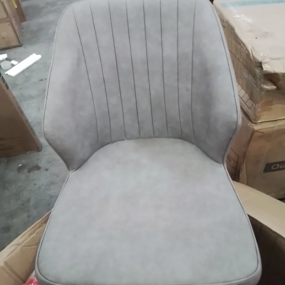 A BOXED PAIR OF GREY FAUX LEATHER UPHOLSTERED SIDE CHAIRS 