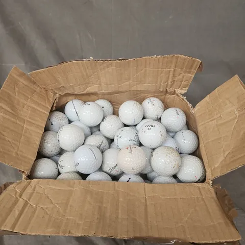 APPROXIMATELY 30 ASSORTED GOLF BALLS IN WHITE