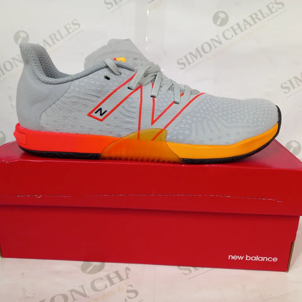 BOXED PAIR OF NEW BALANCE MINIMUS TRAINERS IN GREY/RED/ORANGE UK SIZE 9