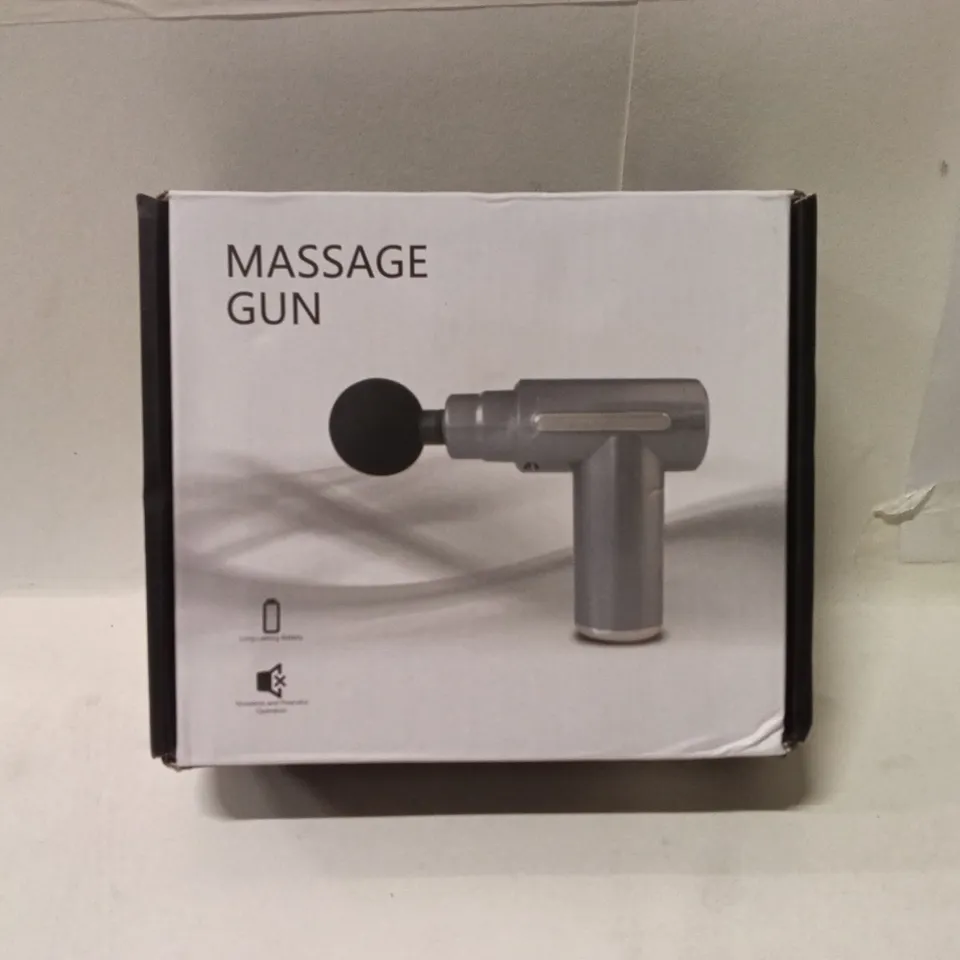 Massage Gun – Four massage heads