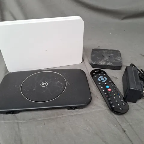 APPROXIMATELY 10 ASSORTED ELECTRICAL PRODUCTS TO INCLUDE ROUTERS, POWER SUPPLIES, REPLACEMENT REMOTES ETC 