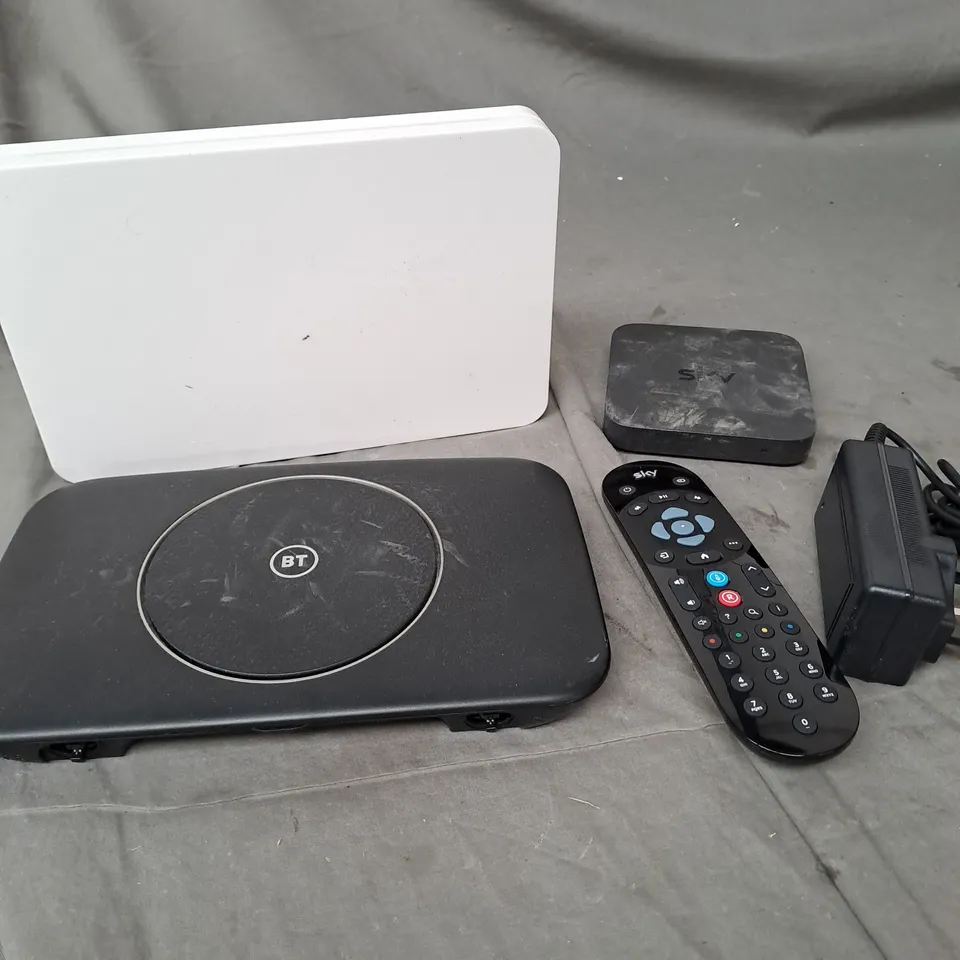 APPROXIMATELY 10 ASSORTED ELECTRICAL PRODUCTS TO INCLUDE ROUTERS, POWER SUPPLIES, REPLACEMENT REMOTES ETC 