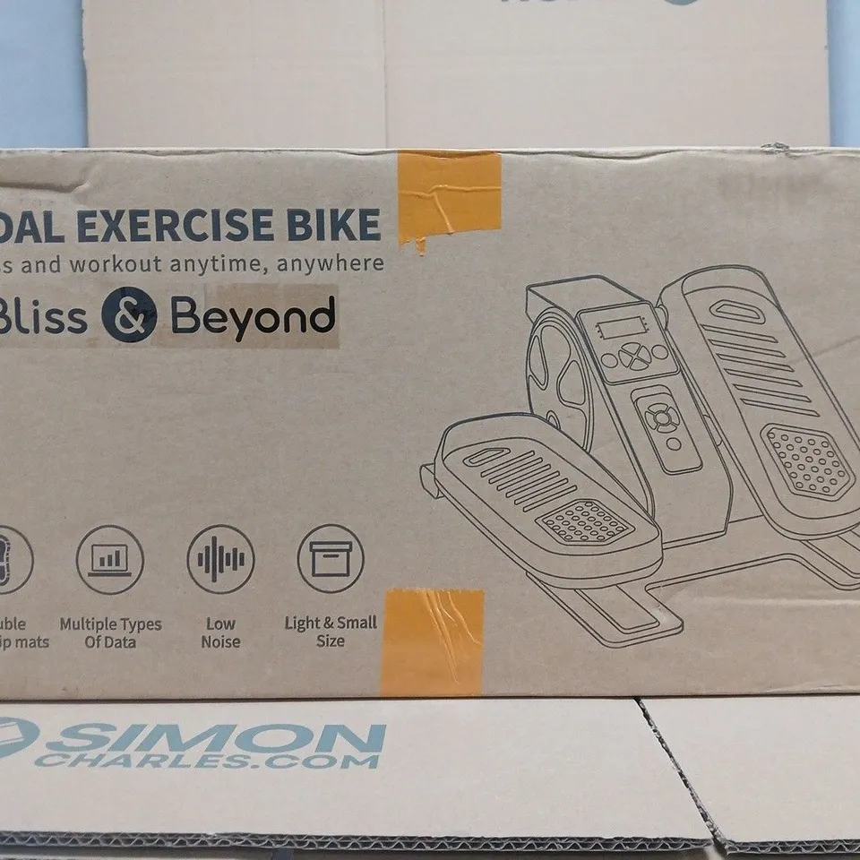 BOXED BLISS & BEYOND PEDAL EXERCISE BIKE