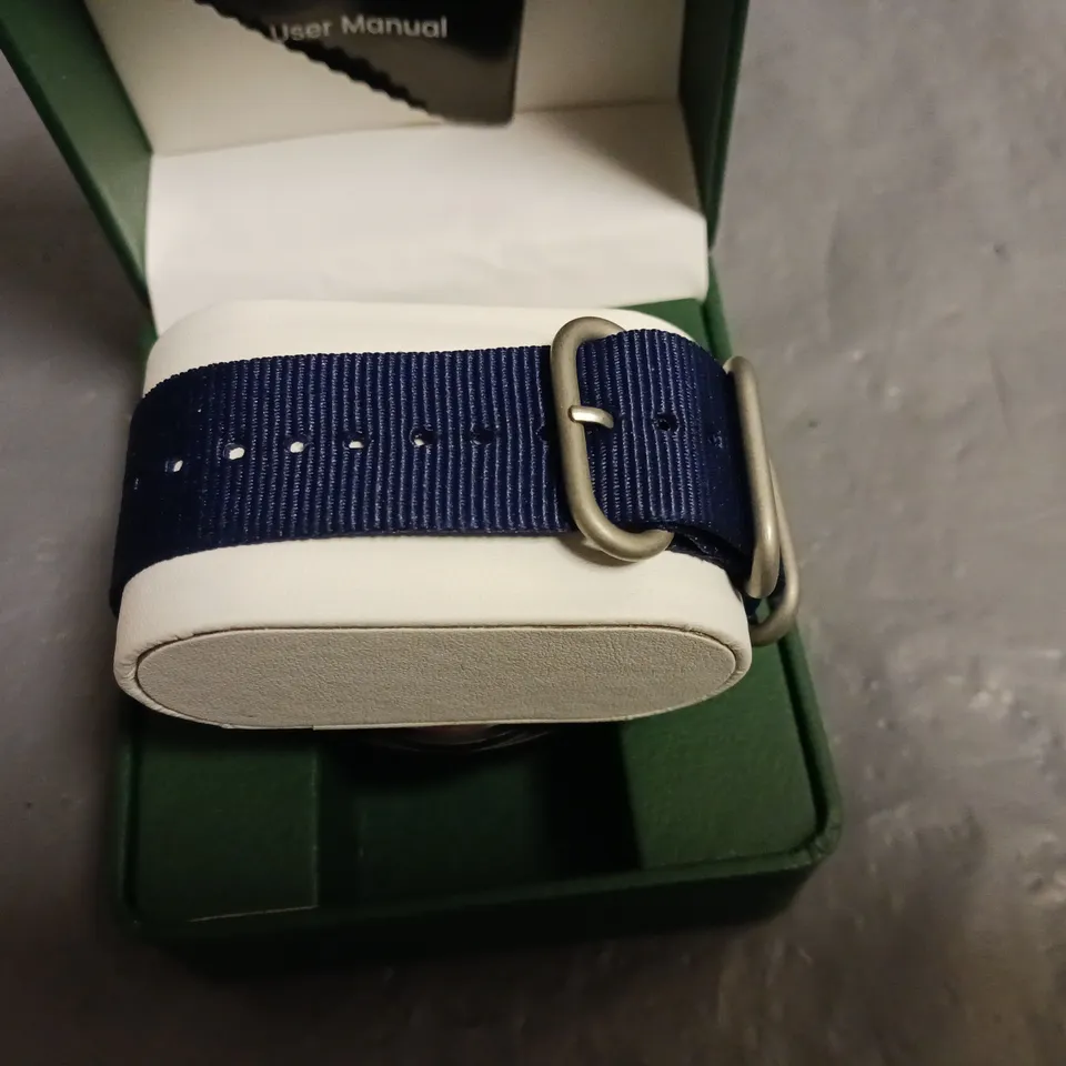 FRANK SCHIMDT WHITE DIAL GENTS WATCH WITH BLUE FABRIC STRAP AND BLACK CASE WITH STAINLESS STEEL BACK IN BOX