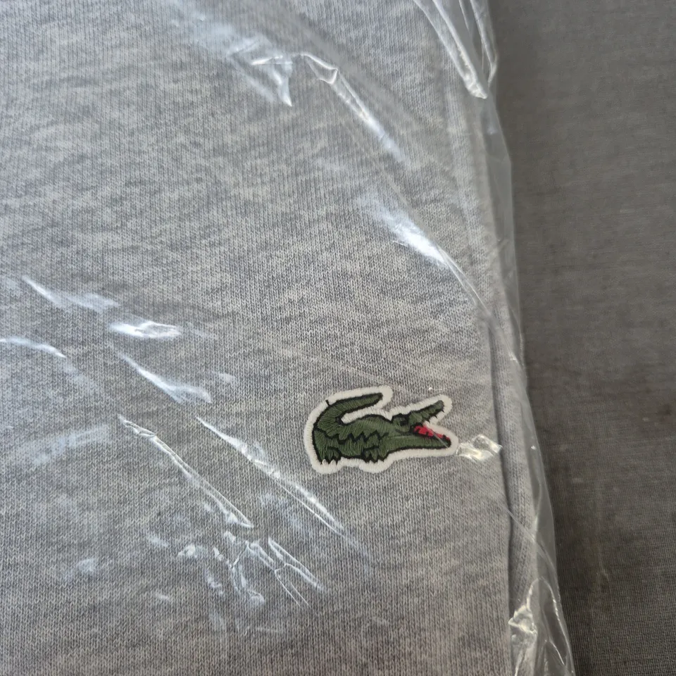 BAGGED LACOSTE GREY TRACKSUIT BOTTOMS - SIZE 4 