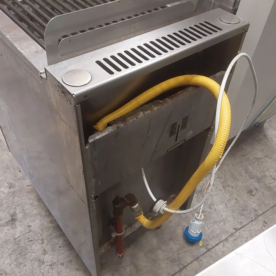 BONNET GAS LAVA ROCK GRILL ON CUPBOARD UNIT