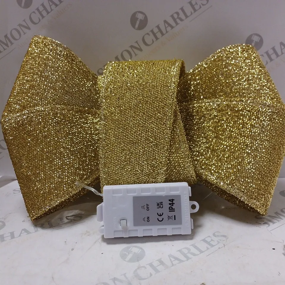 GOLD BATTERY OPERATED DOOR BOW  RRP £19.99