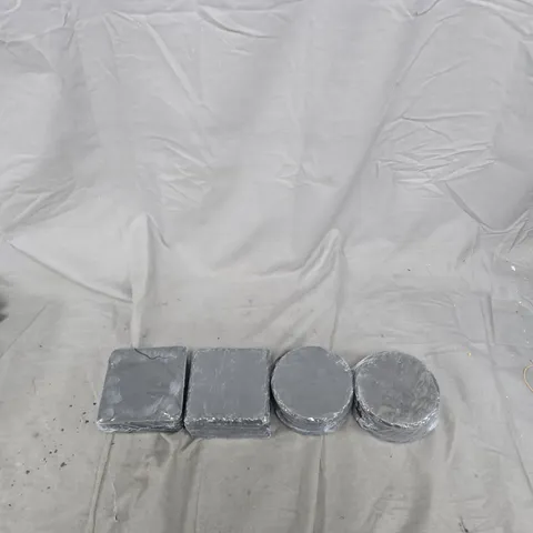 APPROXIMATELY 22 STONE COASTERS