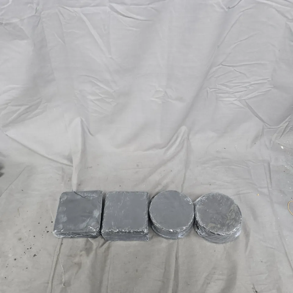 APPROXIMATELY 22 STONE COASTERS