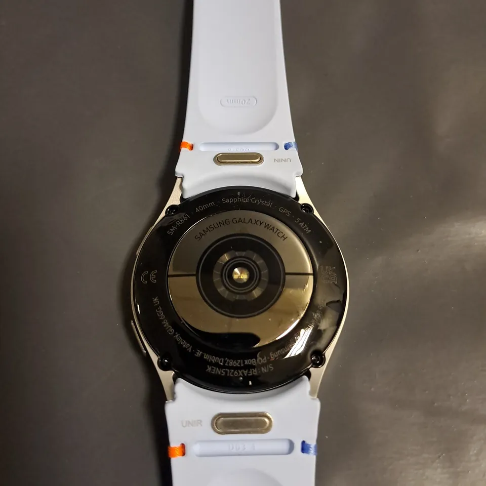 BOXED SAMSUNG GALAXY WATCH FE 40MM IN SILVER WITH BLUE STRAP - RM-R861