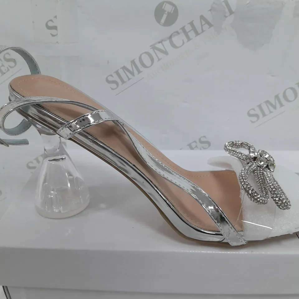 BOXED PAIR OF ASTUCCIO OPEN TOE HEELS IN SILVER - SIZE 43