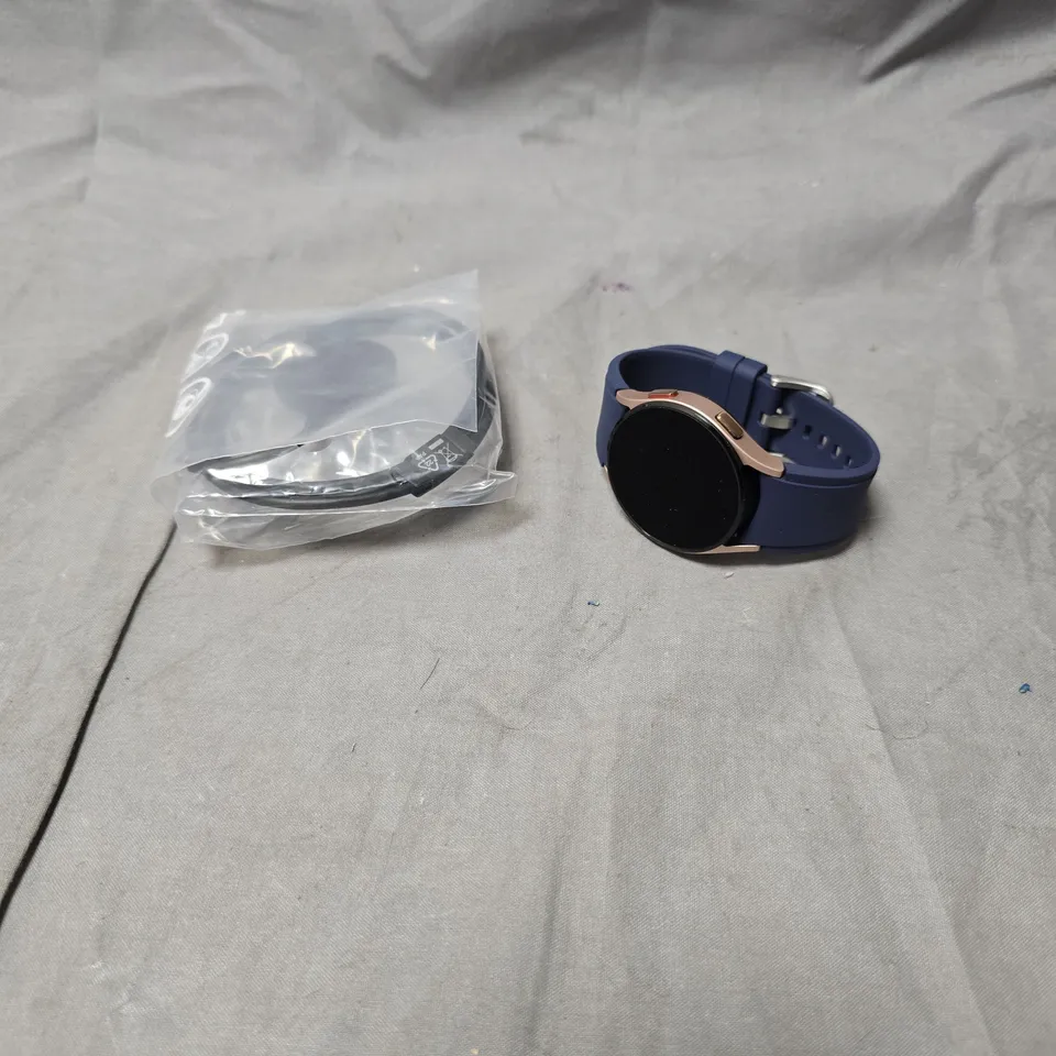 SAMSUNG GALAXY WATCH 4 40MM LTE PINK GOLD WITH BLUE SILICONE STRAP