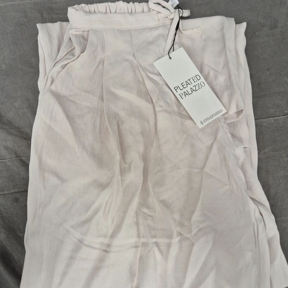 STRADIVARIUS PLEATED PALAZZO TROUSERS IN CREAM SIZE XS